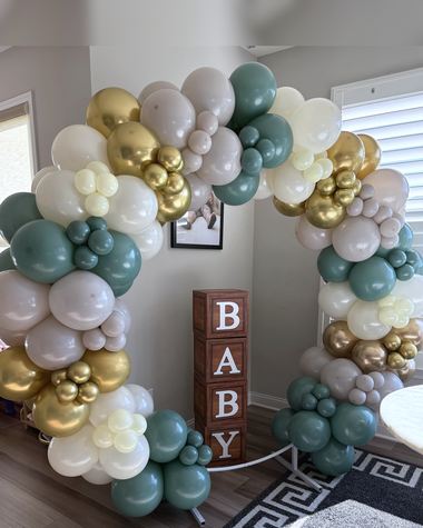 Sage, cream and gold garland with lettered blocks, built by Sherri's Heavenly Balloons in central Indiana.