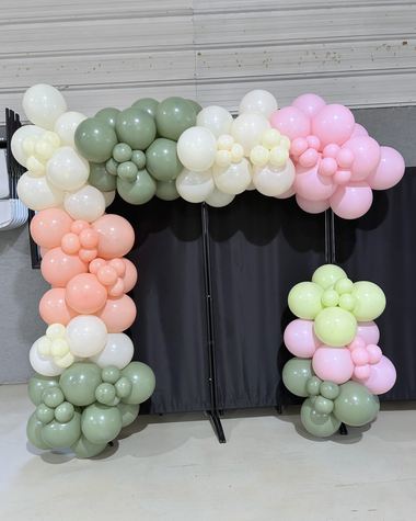 Sage, blush and cream garland with an asymmetric crown, built by Sherri's Heavenly Balloons in central Indiana.