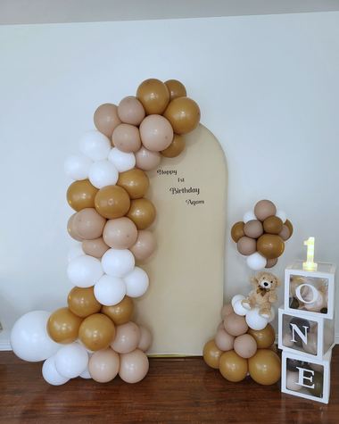 Camel, tan and cream garland with lettered blocks, built by Sherri's Heavenly Balloons in central Indiana.