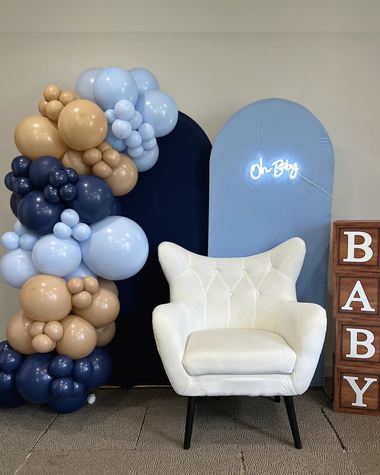 Navy, powder blue and tan garland with a neon sign, built by Sherri's Heavenly Balloons in central Indiana.
