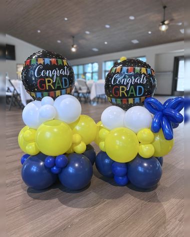 Table toppers in different versions, built by Sherri's Heavenly Balloons in central Indiana.